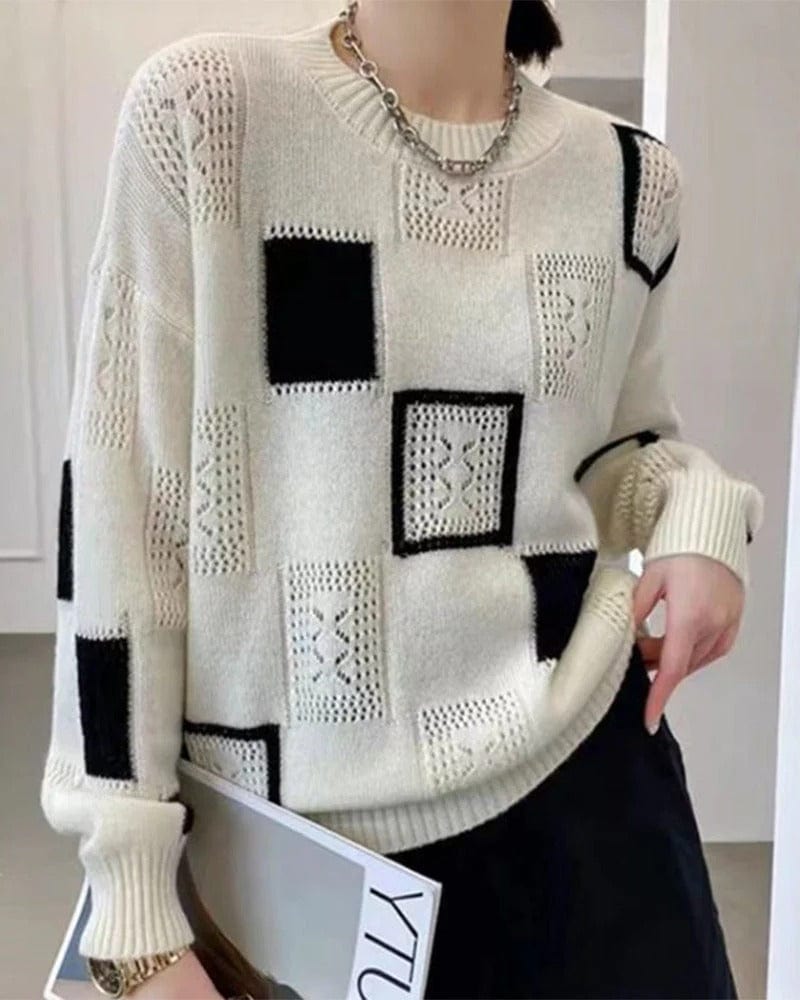 Biały sweter damski