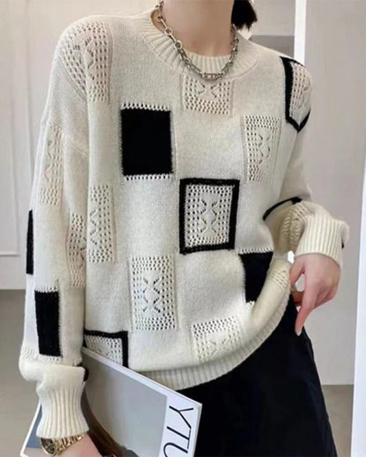 Biały sweter damski