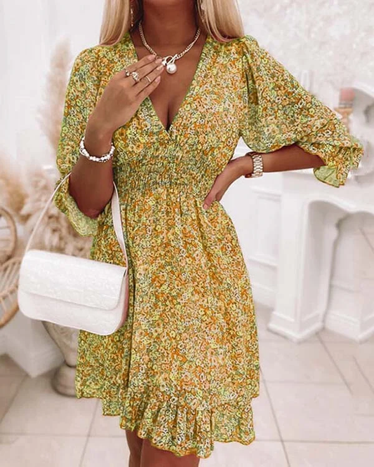 Sukienka w stylu boho w kwiaty z krótkim rękawem