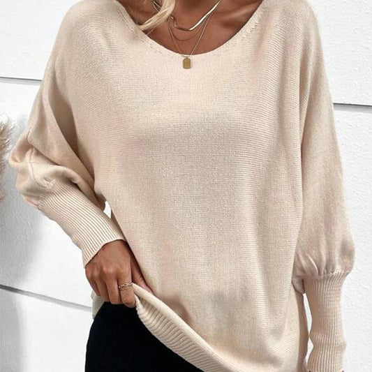Zoe - Elegancki i luźny morelowy sweter damski