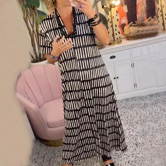 Ilse - Nowoczesna sukienka maxi z krótkim rękawem i dekoltem w szpic