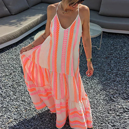 Debbie - Elegancka sukienka bez rękawów z falbanami i swobodnym nadrukiem