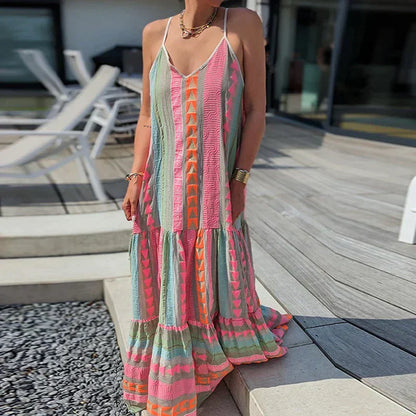 Debbie - Elegancka sukienka bez rękawów z falbanami i swobodnym nadrukiem