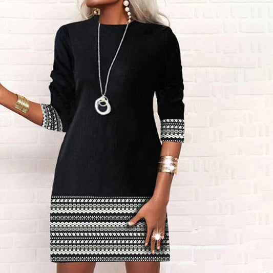- Elegancka casualowa sukienka z nadrukiem
