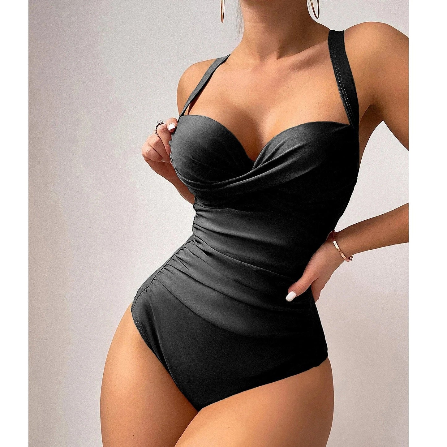 Bikiniodďż˝ďż˝ďż˝ďż˝jednoczÄ™Ĺ›ciowezzakrÄ™conymprzodem
