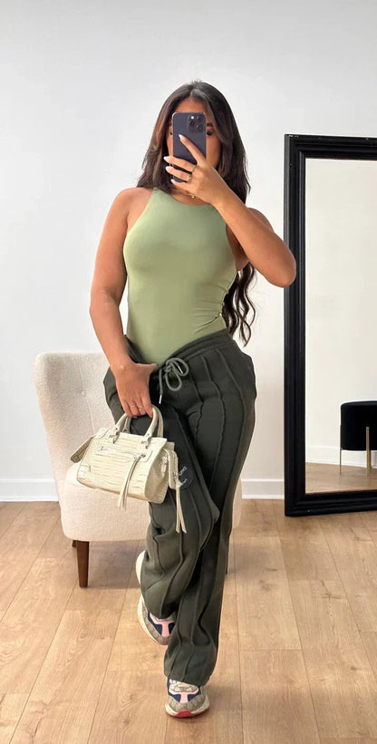 Athena - Damskie spodnie dresowe w paski